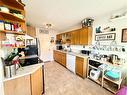 39-101 Mill Street, Hinton, AB  - Indoor Photo Showing Kitchen With Double Sink 