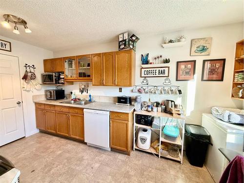 39-101 Mill Street, Hinton, AB - Indoor Photo Showing Kitchen With Double Sink