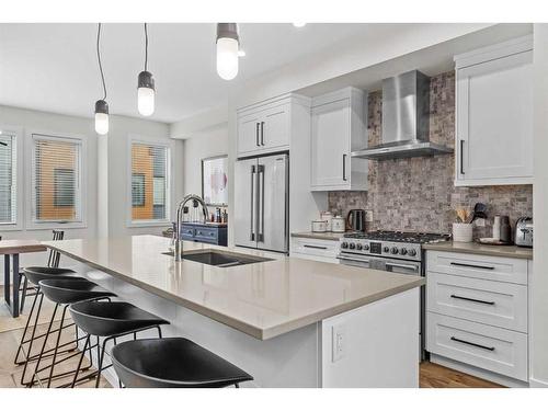 103A-1101 Three Sisters Parkway, Canmore, AB - Indoor Photo Showing Kitchen With Stainless Steel Kitchen With Double Sink With Upgraded Kitchen