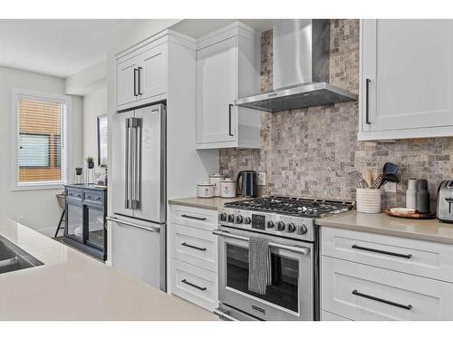 103A-1101 Three Sisters Parkway, Canmore, AB - Indoor Photo Showing Kitchen With Stainless Steel Kitchen With Upgraded Kitchen