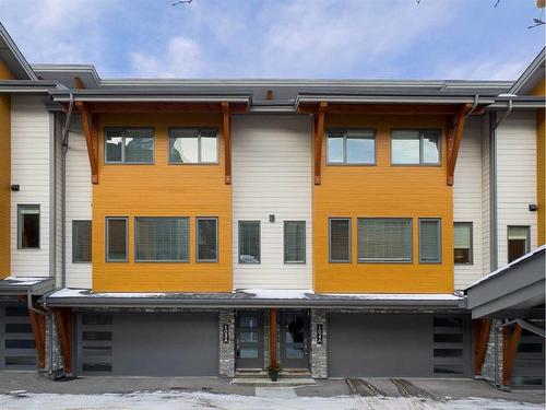 103A-1101 Three Sisters Parkway, Canmore, AB - Outdoor With Facade