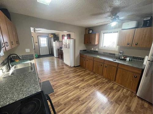 5021 10 Avenue, Edson, AB - Indoor Photo Showing Kitchen With Double Sink