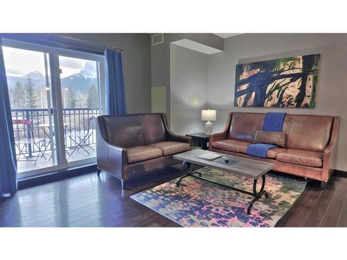 219-901 Mountain Street, Canmore, AB - Indoor Photo Showing Living Room