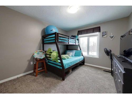 1217 Southshore Drive West, Canyon Creek, AB - Indoor Photo Showing Bedroom