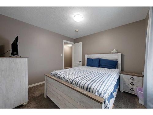 1217 Southshore Drive West, Canyon Creek, AB - Indoor Photo Showing Bedroom