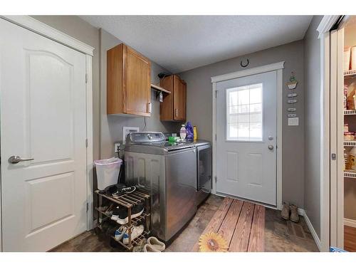 1217 Southshore Drive West, Canyon Creek, AB - Indoor Photo Showing Laundry Room