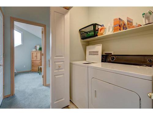 111 Morris, Canmore, AB - Indoor Photo Showing Laundry Room