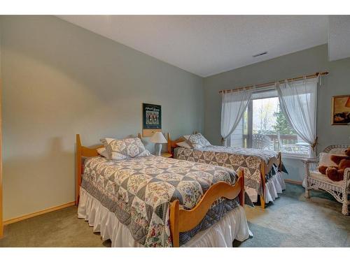 111 Morris, Canmore, AB - Indoor Photo Showing Bedroom