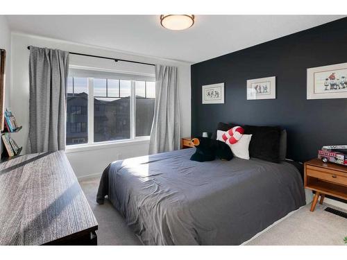 188 Emberside Hollow, Cochrane, AB - Indoor Photo Showing Bedroom