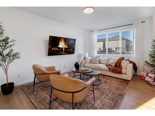 188 Emberside Hollow, Cochrane, AB - Indoor Photo Showing Living Room