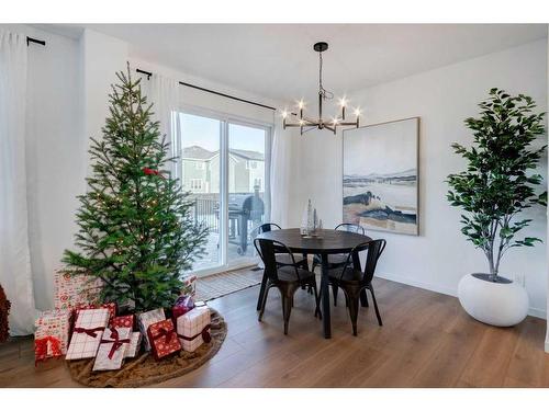 188 Emberside Hollow, Cochrane, AB - Indoor Photo Showing Dining Room