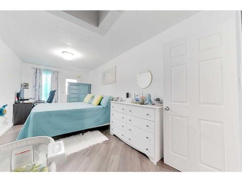 104-205 12 Avenue Sw, Slave Lake, AB - Indoor Photo Showing Bedroom