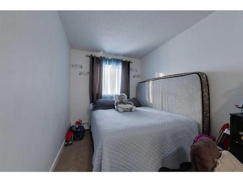 104-205 12 Avenue Sw, Slave Lake, AB - Indoor Photo Showing Bedroom