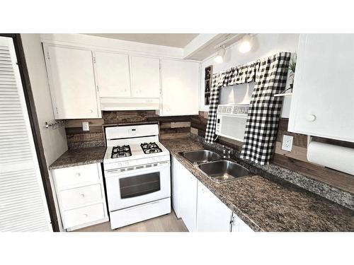 1217 Baptiste Drive, Athabasca, AB - Indoor Photo Showing Kitchen With Double Sink