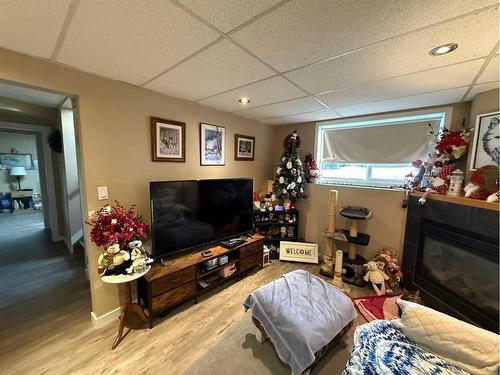 4810 16 Avenue, Edson, AB - Indoor Photo Showing Living Room With Fireplace