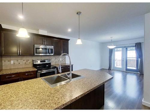 4312 18 Avenue, Edson, AB - Indoor Photo Showing Kitchen With Stainless Steel Kitchen With Double Sink With Upgraded Kitchen