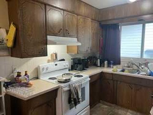 26/26A Whitecourt Avenue, Whitecourt, AB - Indoor Photo Showing Kitchen With Double Sink