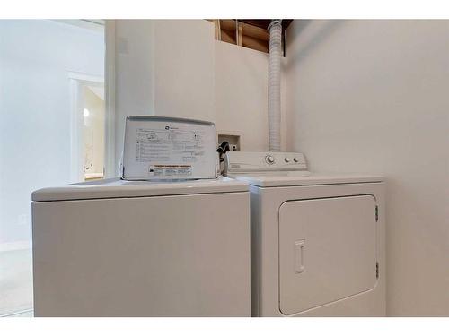 119-116 6 Ave Ne, Slave Lake, AB - Indoor Photo Showing Laundry Room