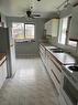 27 Beaver Drive, Whitecourt, AB  - Indoor Photo Showing Kitchen With Double Sink 