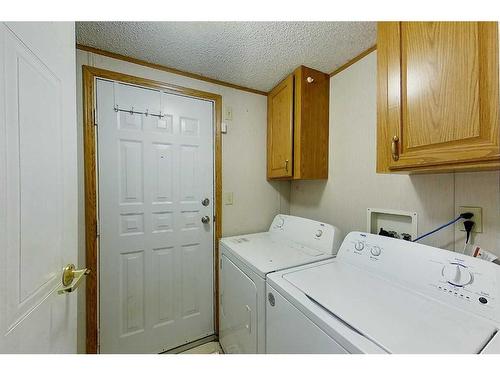 620 2A Avenue Sw, Slave Lake, AB - Indoor Photo Showing Laundry Room