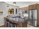 204I-209 Stewart Creek Rise, Canmore, AB  - Indoor Photo Showing Kitchen With Upgraded Kitchen 