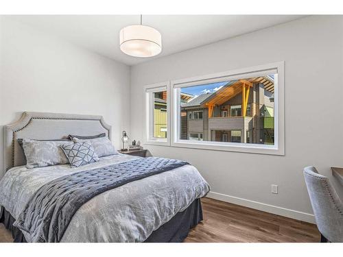 204I-209 Stewart Creek Rise, Canmore, AB - Indoor Photo Showing Bedroom