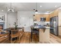 201F-209 Stewart Creek Rise, Canmore, AB  - Indoor Photo Showing Kitchen With Upgraded Kitchen 