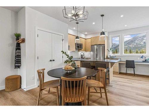 201F-209 Stewart Creek Rise, Canmore, AB - Indoor Photo Showing Dining Room