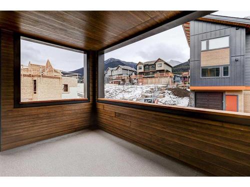 202F-209 Stewart Creek Rise, Canmore, AB - Outdoor With Exterior