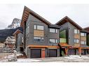 202F-209 Stewart Creek Rise, Canmore, AB  - Outdoor With Facade 