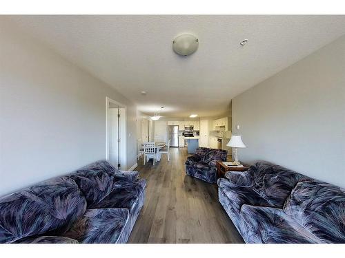 303-5037 7 Avenue, Edson, AB - Indoor Photo Showing Living Room