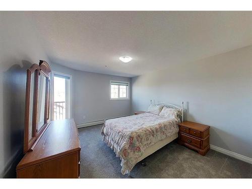 303-5037 7 Avenue, Edson, AB - Indoor Photo Showing Bedroom