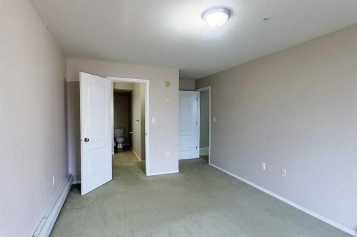 302-1615 41 Street, Edson, AB - Indoor Photo Showing Other Room