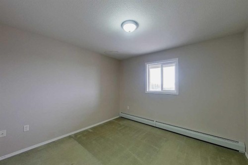 302-1615 41 Street, Edson, AB - Indoor Photo Showing Other Room