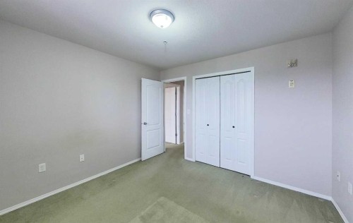 302-1615 41 Street, Edson, AB - Indoor Photo Showing Other Room