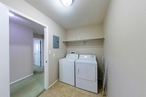 302-1615 41 Street, Edson, AB - Indoor Photo Showing Laundry Room