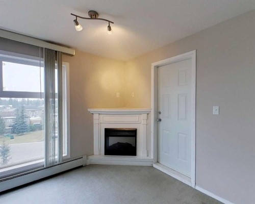 302-1615 41 Street, Edson, AB - Indoor With Fireplace