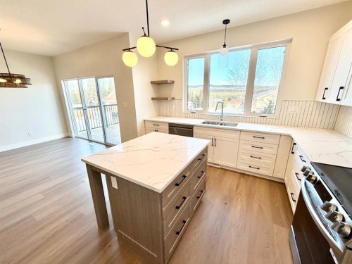 128 Trestle Place, Hinton, AB - Indoor Photo Showing Kitchen With Double Sink