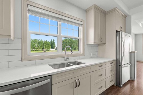 18 Sonoma Key, Whitecourt, AB - Indoor Photo Showing Kitchen With Double Sink