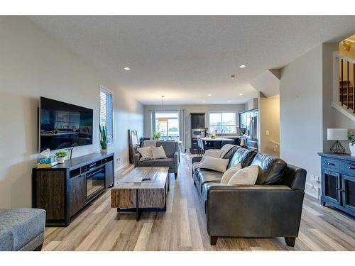 215 Auburn Meadows Place Se, Calgary, AB - Indoor Photo Showing Living Room With Fireplace