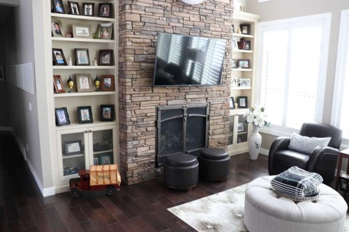 6663 15 Avenue, Edson, AB - Indoor Photo Showing Living Room With Fireplace