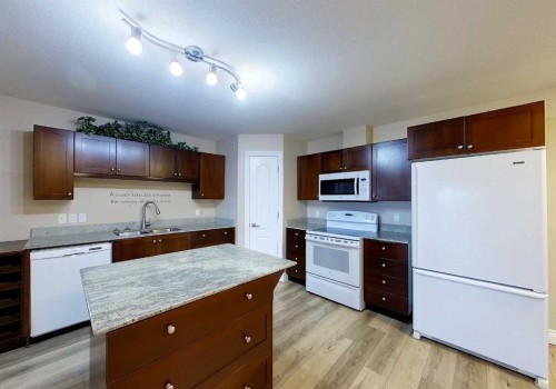 406-5037 7 Avenue, Edson, AB - Indoor Photo Showing Kitchen With Double Sink