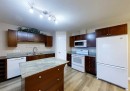 406-5037 7 Avenue, Edson, AB  - Indoor Photo Showing Kitchen With Double Sink 