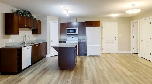 406-5037 7 Avenue, Edson, AB - Indoor Photo Showing Kitchen With Double Sink