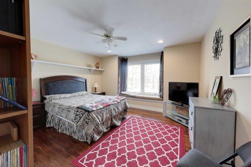 30 Executive Estates, Canyon Creek, AB - Indoor Photo Showing Bedroom
