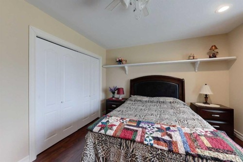 30 Executive Estates, Canyon Creek, AB - Indoor Photo Showing Bedroom