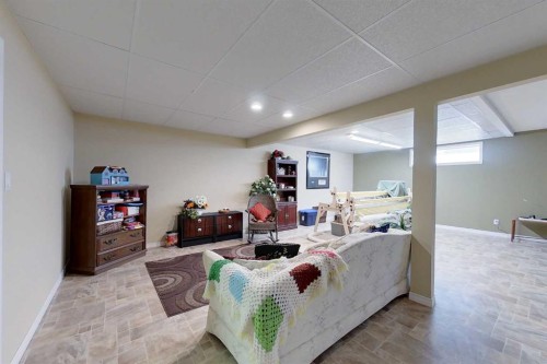 30 Executive Estates, Canyon Creek, AB - Indoor Photo Showing Basement