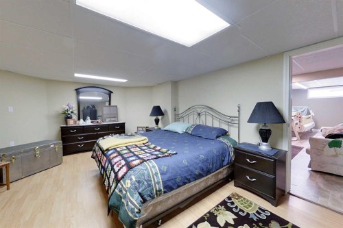 30 Executive Estates, Canyon Creek, AB - Indoor Photo Showing Bedroom
