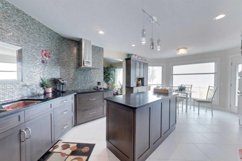 30 Executive Estates, Canyon Creek, AB - Indoor Photo Showing Kitchen With Upgraded Kitchen