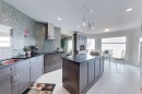 30 Executive Estates, Canyon Creek, AB  - Indoor Photo Showing Kitchen With Upgraded Kitchen 